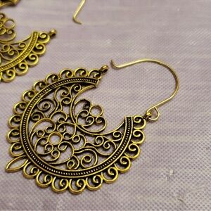 Drop Dangle Boho Style Gold Hoop
Earings. Brand New
13/4" Wide with a 2" drop